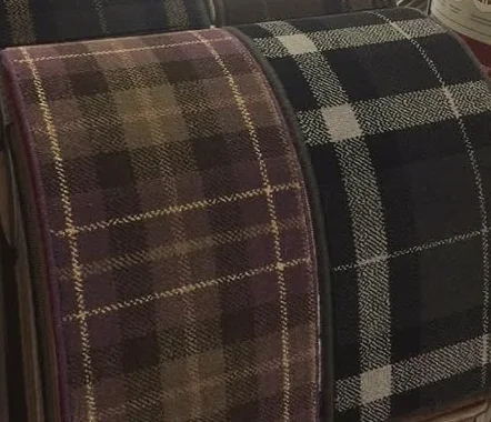 Close view of plum and navy tartan carpet samples